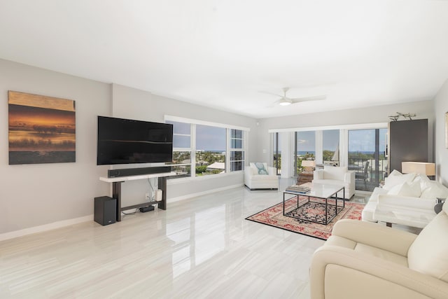 400 Seasage Dr Unit 805, Delray Beach, FL 33483 - living area featuring plenty of natural light, baseboards, and ceiling fan