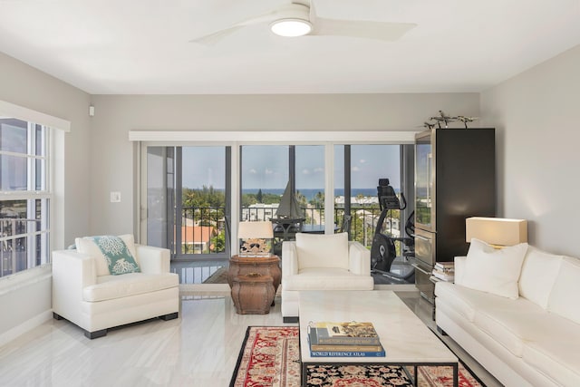 400 Seasage Dr Unit 805, Delray Beach, FL 33483 - living room featuring ceiling fan and baseboards