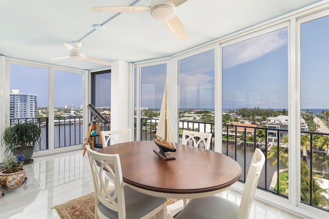 400 Seasage Dr Unit 805, Delray Beach, FL 33483 - sunroom with a water view, healthy amount of natural light, expansive windows, and a city view