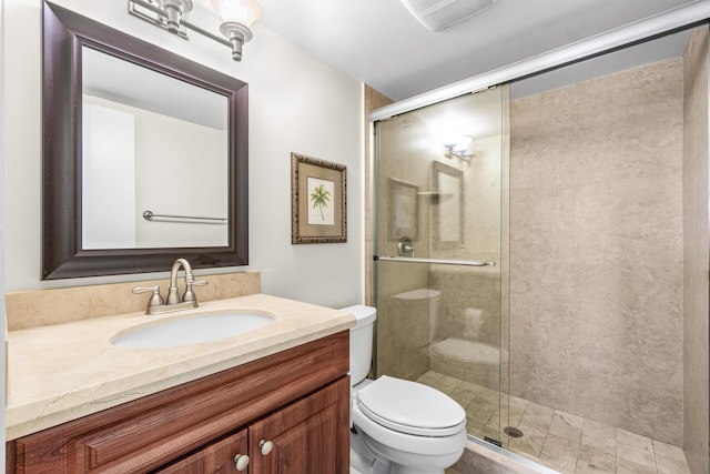 55 SW 2nd Ave Unit 405G, Boca Raton, FL 33432 - full bath featuring toilet, a stall shower, and vanity