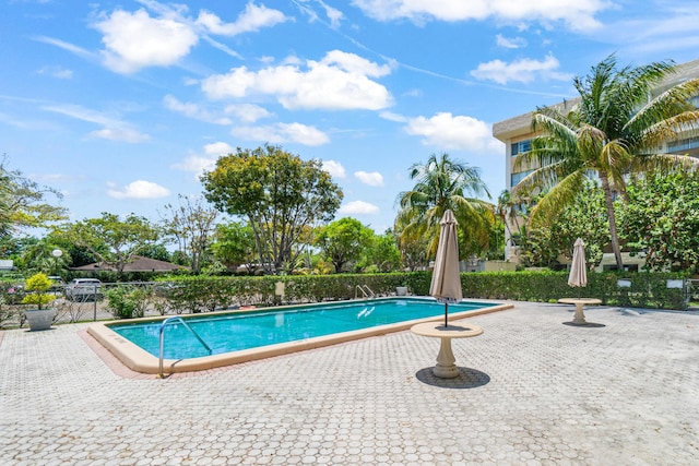 55 SW 2nd Ave Unit 405G, Boca Raton, FL 33432 - community pool featuring a patio area and fence