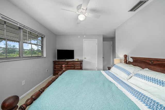 251 Grape Rd NW, Lake Placid, FL 33852 - bedroom featuring baseboards, a ceiling fan, and carpet floors