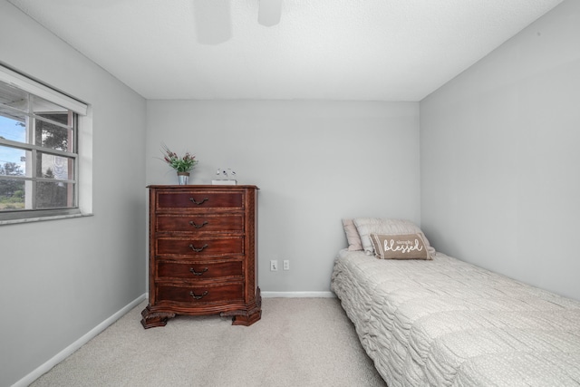 251 Grape Rd NW, Lake Placid, FL 33852 - carpeted bedroom with baseboards and a ceiling fan
