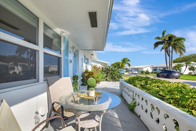 balcony with a porch and a residential view