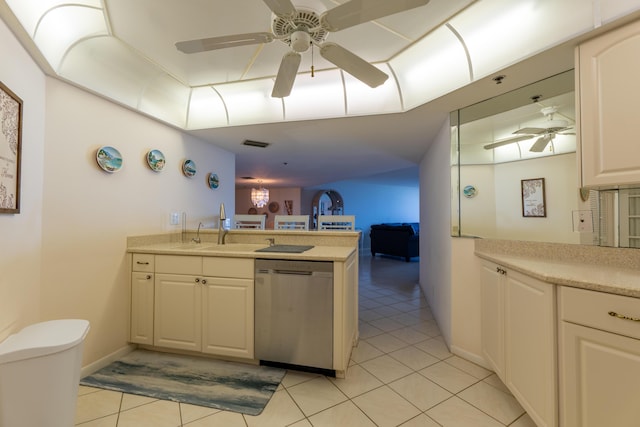 kitchen with stainless steel dishwasher, a sink, a ceiling fan, and light tile patterned floors