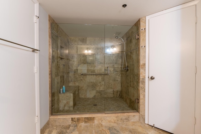 bathroom with a stall shower