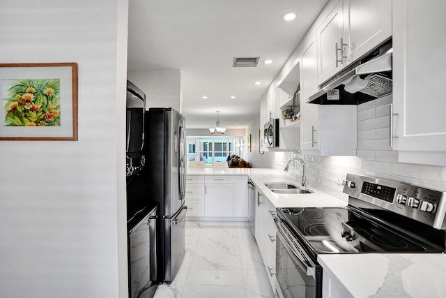 kitchen featuring stainless steel appliances, a sink, under cabinet range hood, open shelves, and white cabinets