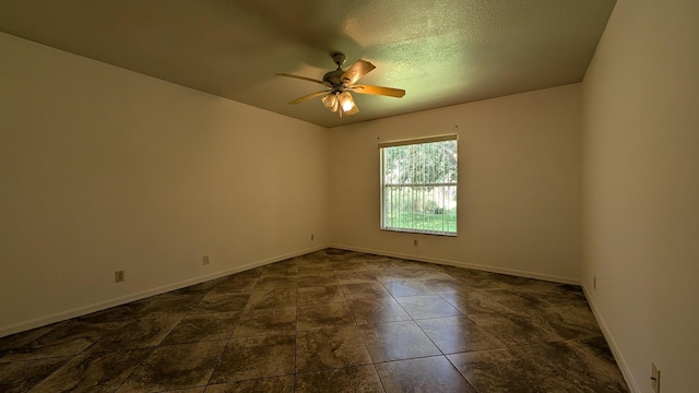 1500 SW Bermel Ave, Port Saint Lucie, FL 34953 - unfurnished room featuring a ceiling fan, baseboards, and a textured ceiling