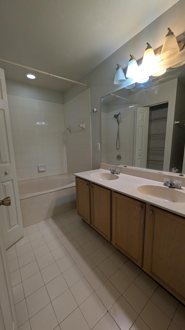 1500 SW Bermel Ave, Port Saint Lucie, FL 34953 - bathroom with tile patterned flooring, bathing tub / shower combination, and double vanity