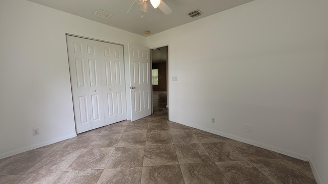 1500 SW Bermel Ave, Port Saint Lucie, FL 34953 - unfurnished bedroom with baseboards, a closet, and ceiling fan