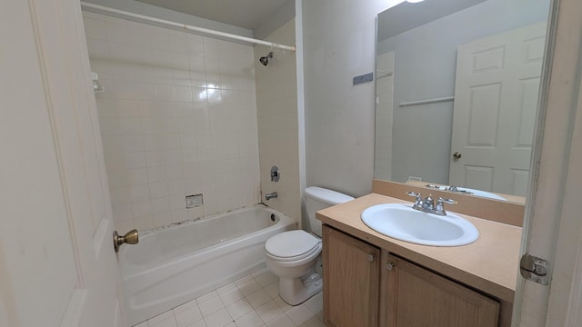1500 SW Bermel Ave, Port Saint Lucie, FL 34953 - bathroom featuring tile patterned flooring, toilet, vanity, and bathtub / shower combination