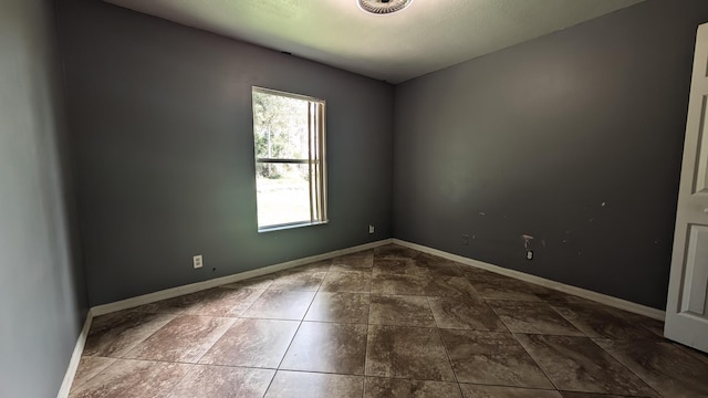 1500 SW Bermel Ave, Port Saint Lucie, FL 34953 - spare room featuring baseboards
