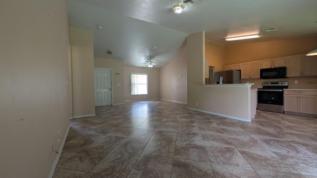 1500 SW Bermel Ave, Port Saint Lucie, FL 34953 - kitchen with stainless steel electric stove, black microwave, refrigerator with ice dispenser, lofted ceiling, and baseboards