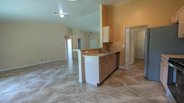 1500 SW Bermel Ave, Port Saint Lucie, FL 34953 - kitchen featuring a sink, dishwasher, vaulted ceiling, electric range, and light countertops