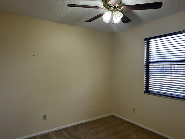 1433 SW San Esteban Ave, Port Saint Lucie, FL 34953 - carpeted empty room with ceiling fan, a textured ceiling, plenty of natural light, and baseboards