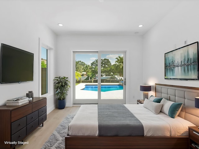 8 Leeward Cir, Tequesta, FL 33469 - bedroom with access to exterior, light wood-style floors, and recessed lighting