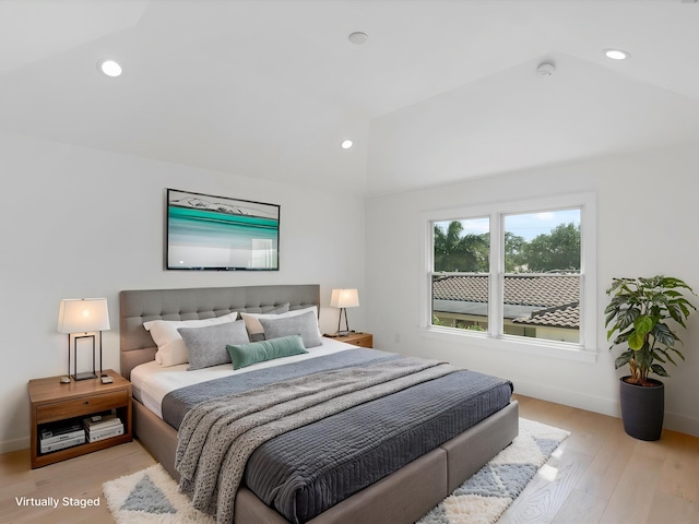8 Leeward Cir, Tequesta, FL 33469 - bedroom with lofted ceiling, light wood-type flooring, and recessed lighting