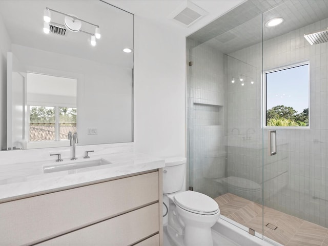 8 Leeward Cir, Tequesta, FL 33469 - bathroom featuring toilet, a shower stall, and vanity