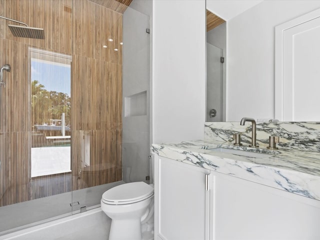 8 Leeward Cir, Tequesta, FL 33469 - full bath with a stall shower, toilet, and vanity