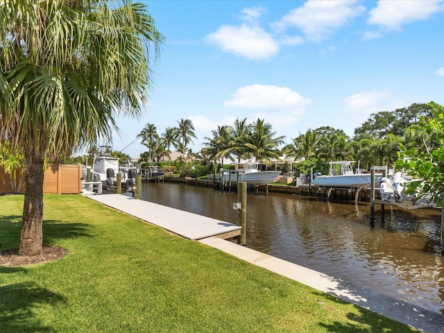 8 Leeward Cir, Tequesta, FL 33469 - dock featuring a water view and a lawn