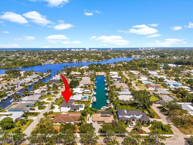 8 Leeward Cir, Tequesta, FL 33469 - aerial view of property and surrounding area with a nearby body of water and nearby suburban area