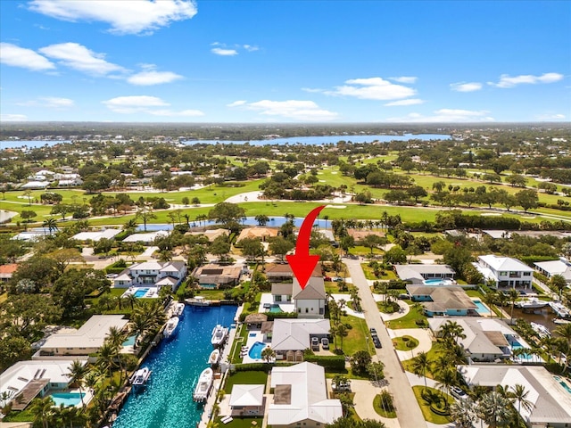 8 Leeward Cir, Tequesta, FL 33469 - aerial perspective of suburban area featuring a large body of water and a local golf course