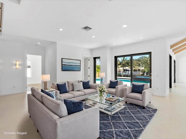 8 Leeward Cir, Tequesta, FL 33469 - living room featuring recessed lighting and baseboards
