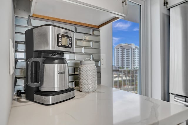 3100 S Ocean Blvd Unit 620, Highland Beach, FL 33487 - kitchen view of stainless steel fridge and a view of city