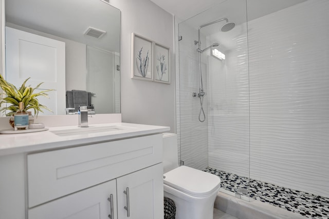 3100 S Ocean Blvd Unit 620, Highland Beach, FL 33487 - bathroom featuring a shower stall, toilet, and vanity