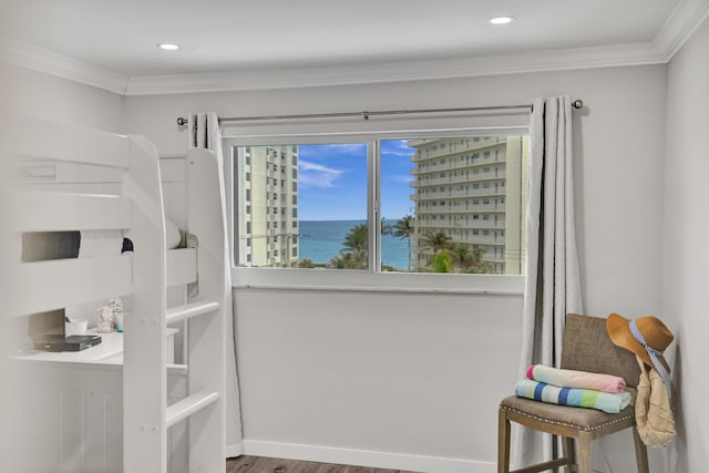 3100 S Ocean Blvd Unit 620, Highland Beach, FL 33487 - entryway featuring crown molding, a water view, wood finished floors, and recessed lighting
