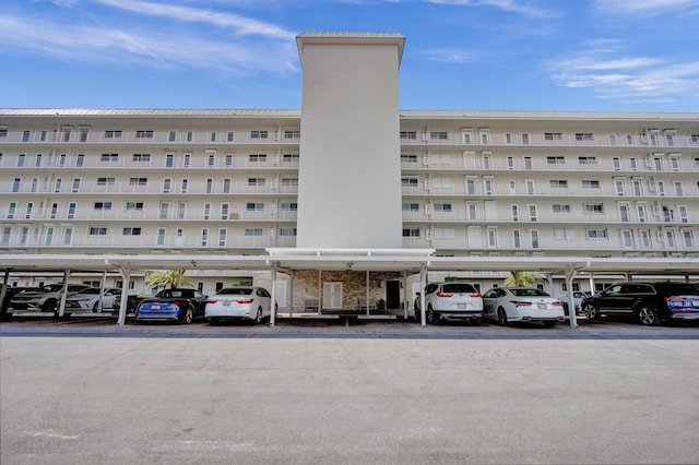 3100 S Ocean Blvd Unit 620, Highland Beach, FL 33487 - view of apartment building / complex with covered parking