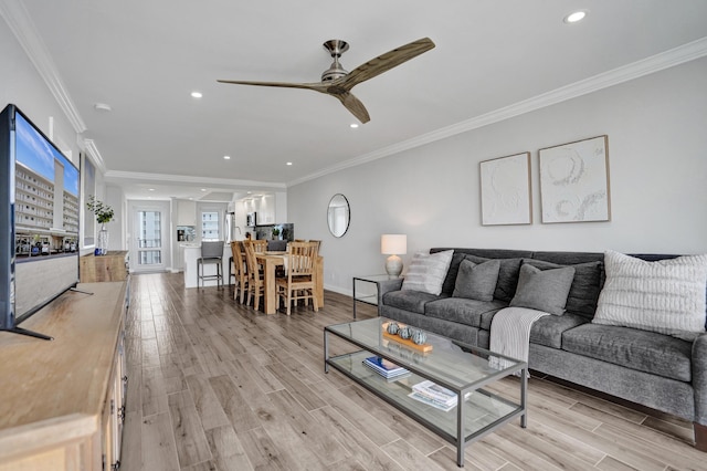 3100 S Ocean Blvd Unit 620, Highland Beach, FL 33487 - living room featuring ceiling fan, light wood finished floors, recessed lighting, crown molding, and baseboards