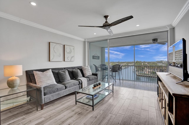3100 S Ocean Blvd Unit 620, Highland Beach, FL 33487 - living area featuring a wall of windows, a ceiling fan, wood finished floors, ornamental molding, and recessed lighting