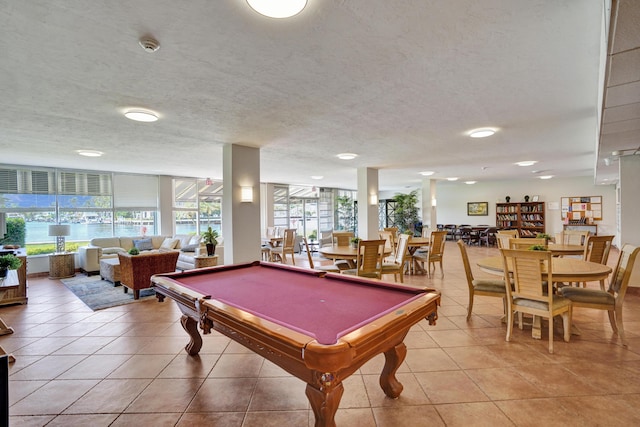 3100 S Ocean Blvd Unit 620, Highland Beach, FL 33487 - playroom with billiards, light tile patterned floors, and a textured ceiling