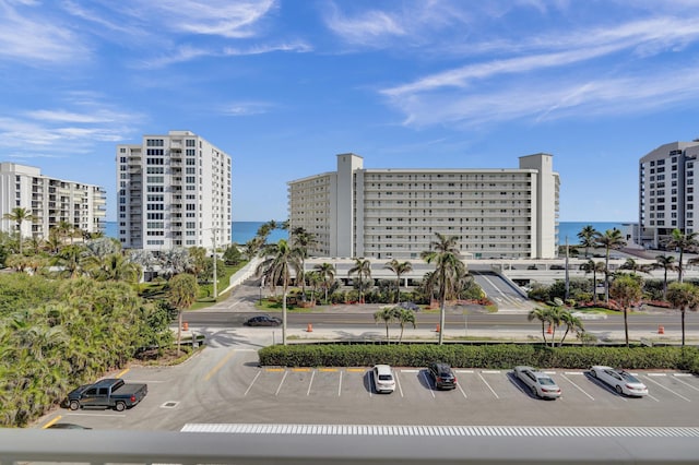 3100 S Ocean Blvd Unit 620, Highland Beach, FL 33487 - view of property featuring uncovered parking, a city view, and a water view