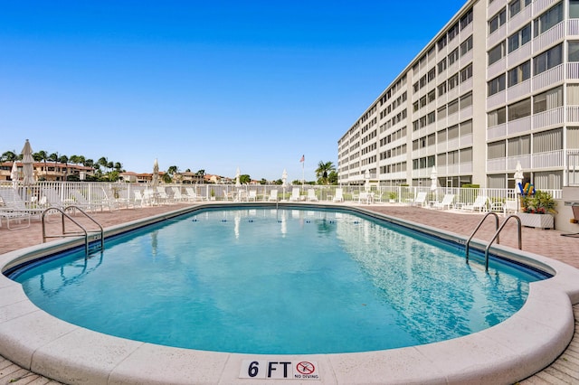 3100 S Ocean Blvd Unit 620, Highland Beach, FL 33487 - community pool with a patio