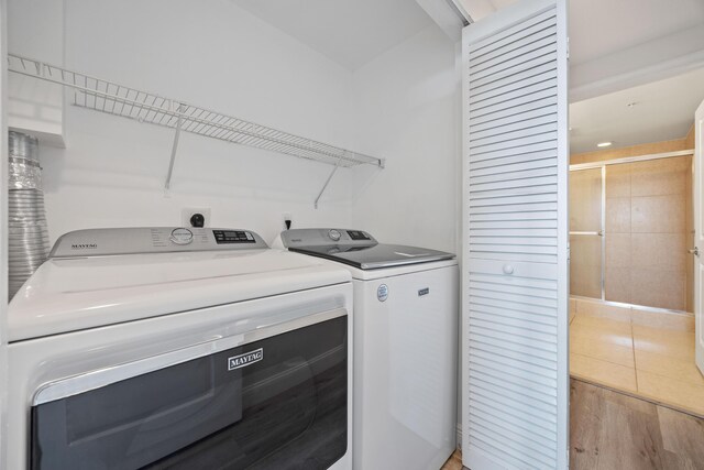 350 N Federal Hwy SE Unit 506, Boynton Beach, FL 33435 - bathroom with toilet, tile patterned flooring, a shower stall, and vanity