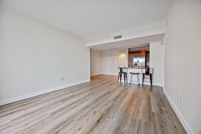 350 N Federal Hwy SE Unit 506, Boynton Beach, FL 33435 - living area with light wood finished floors and baseboards