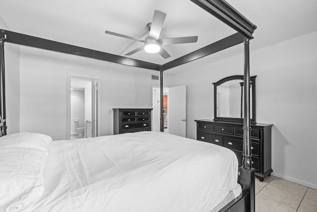 250 NE 20th St Unit 1220, Boca Raton, FL 33431 - bedroom featuring light tile patterned floors, a ceiling fan, and connected bathroom
