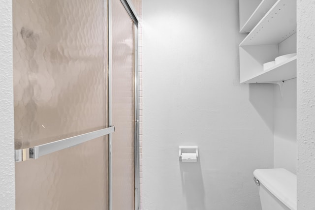 250 NE 20th St Unit 1220, Boca Raton, FL 33431 - full bathroom with toilet and an enclosed shower