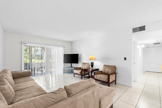 250 NE 20th St Unit 1220, Boca Raton, FL 33431 - living area featuring light tile patterned floors
