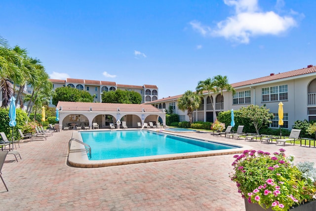 250 NE 20th St Unit 1220, Boca Raton, FL 33431 - community pool featuring a patio area