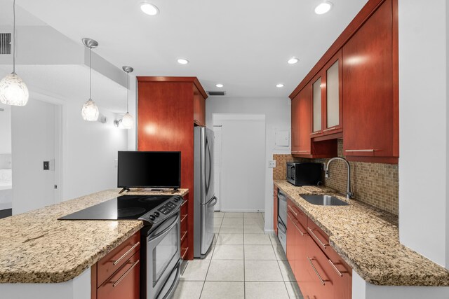 250 NE 20th St Unit 1220, Boca Raton, FL 33431 - kitchen featuring appliances with stainless steel finishes, a sink, decorative backsplash, recessed lighting, and glass insert cabinets