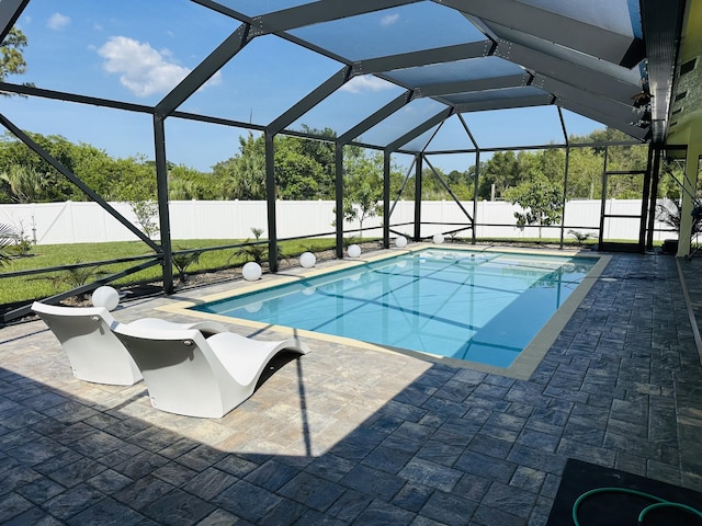 1601 SW California Blvd, Port Saint Lucie, FL 34953 - view of pool featuring a fenced backyard, a patio area, and a lanai