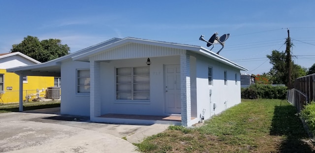 717 Hollywood Pl, West Palm Beach, FL 33405 - view of outdoor structure with covered porch and cooling unit