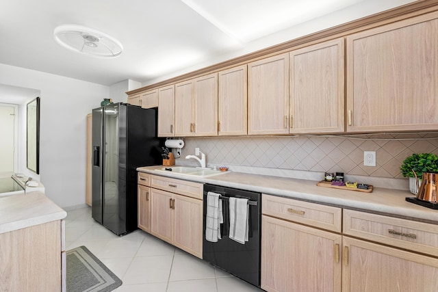 1180 S Ocean Blvd Unit 7B, Boca Raton, FL 33432 - kitchen featuring light brown cabinets, dishwashing machine, a sink, and decorative backsplash