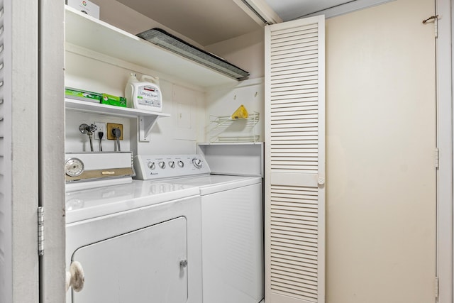 1180 S Ocean Blvd Unit 7B, Boca Raton, FL 33432 - laundry area with washing machine and dryer