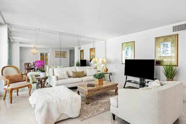 1180 S Ocean Blvd Unit 7B, Boca Raton, FL 33432 - living area with light tile patterned flooring and a chandelier