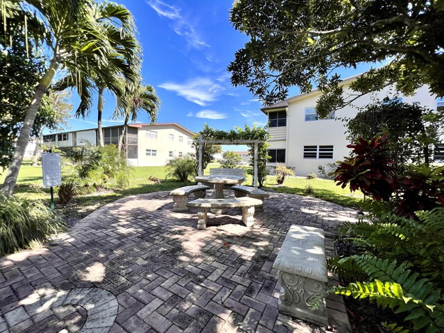 314 Chatham P, West Palm Beach, FL 33417 - view of patio featuring a pergola