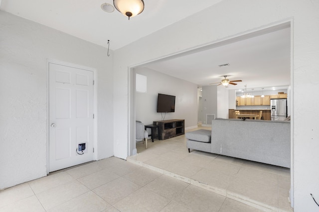 1920 Palmland Dr Unit C, Boynton Beach, FL 33436 - living area with light tile patterned floors and a ceiling fan